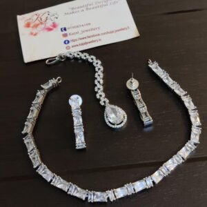 d6094308-99ac-4df6-a8e8-c401ce5bec68.jpeg American diamond choker set