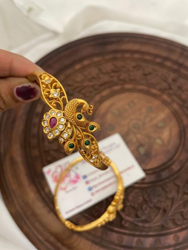 img_5659.jpeg Openable Cz golden bangle for adults
