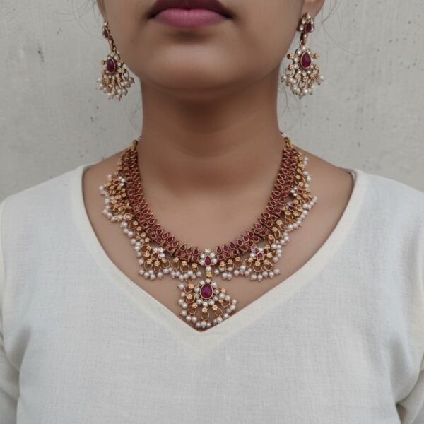 Pink guttapusulu necklace set