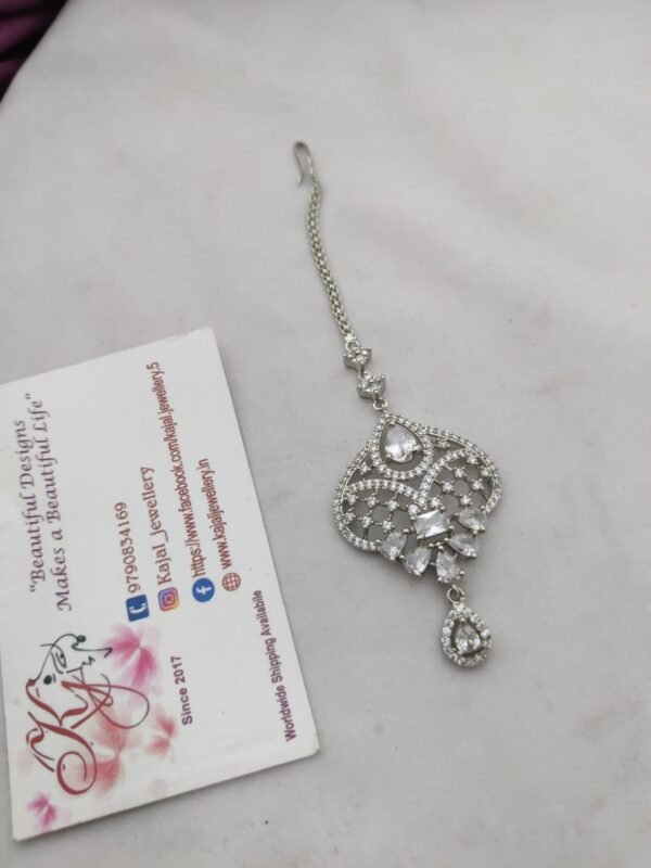 d9d65103-a775-438f-b1cf-b8618223a081 Ad gold nethi chutti white big