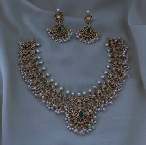 Gold guttapusulu necklace set