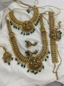 Heavy semi antique model with green beads Kasumalai