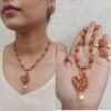 Pink cz peacock necklace ruby