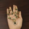 83a31444-4151-4492-a226-122265887298 American diamond green premium stones set