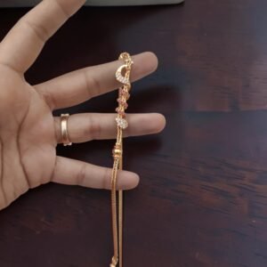 ef75ba9b-a6e4-4736-9ae8-92cf2388e783-Photoroom Peacock spiral chain 2