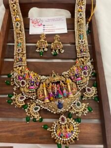 Heavy meenakari white stone model green beads long set