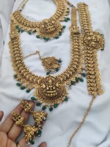 Lakshmi golden with green beads set