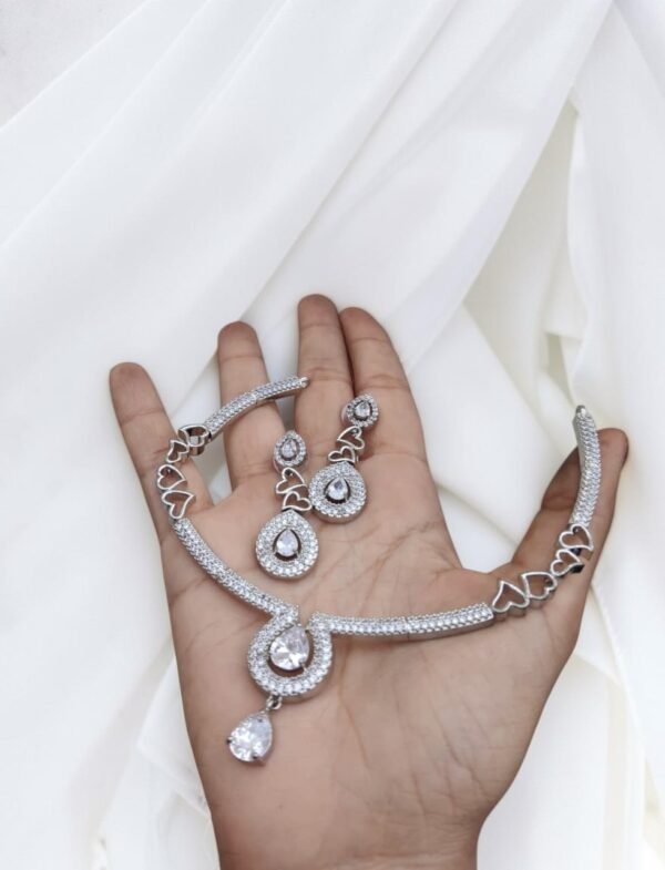 White ad necklace set