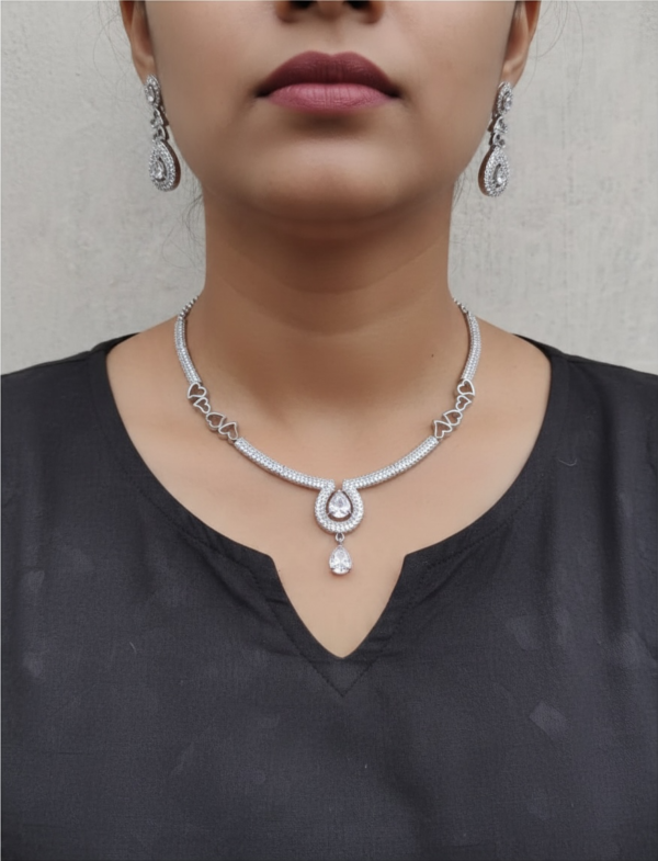 White ad necklace set